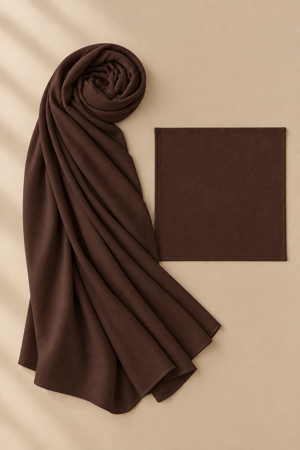 Cocoa modal hijab beside its matching open square undercap