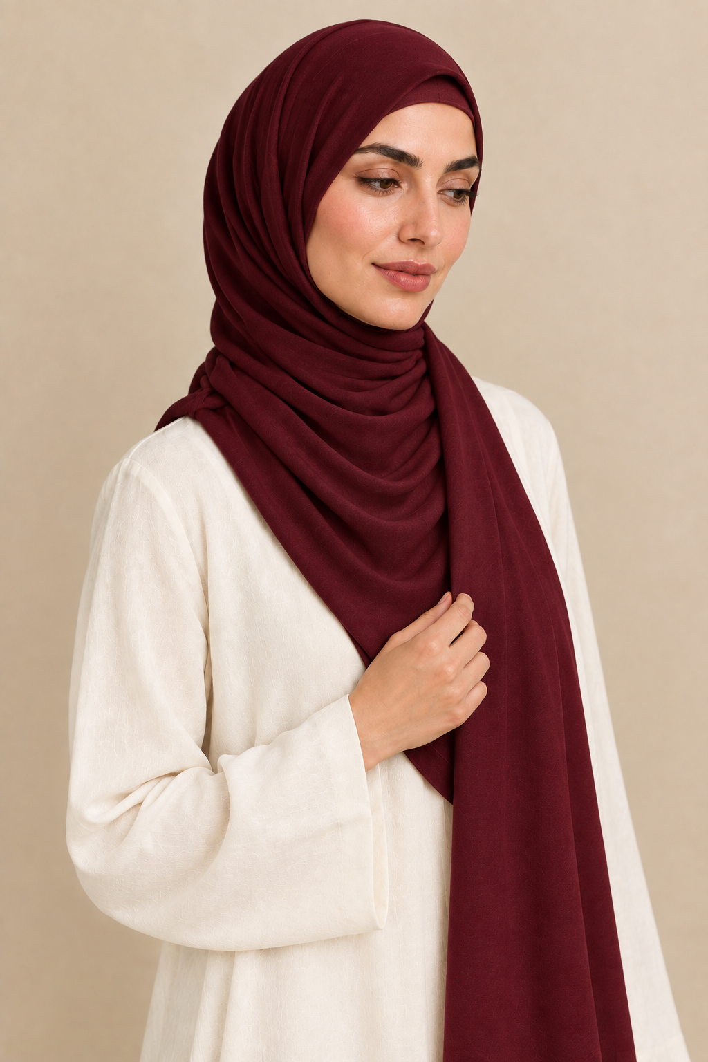 Burgundy hijab portrait showing matching open square undercap