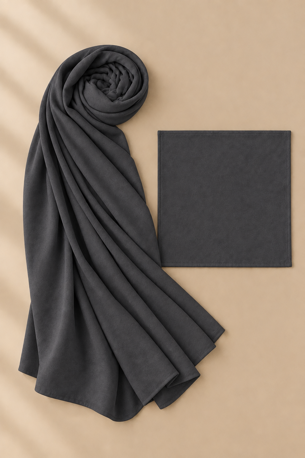 Charcoal modal hijab beside matching open square undercap