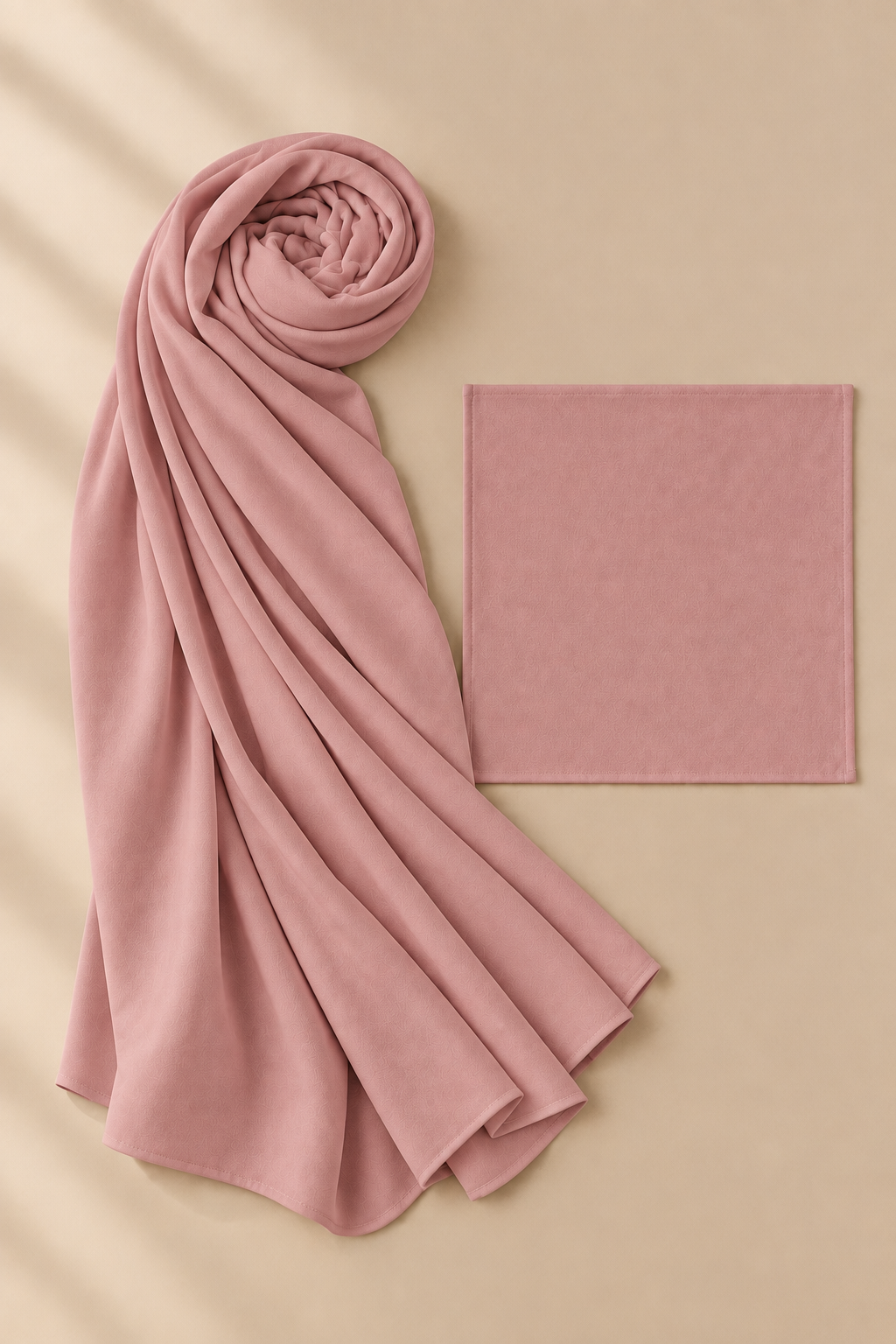 Dusty Rose modal hijab beside its matching open square undercap