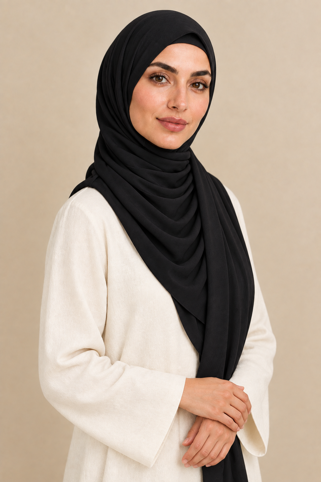 Model wearing a Midnight Black modal hijab in a relaxed angled pose