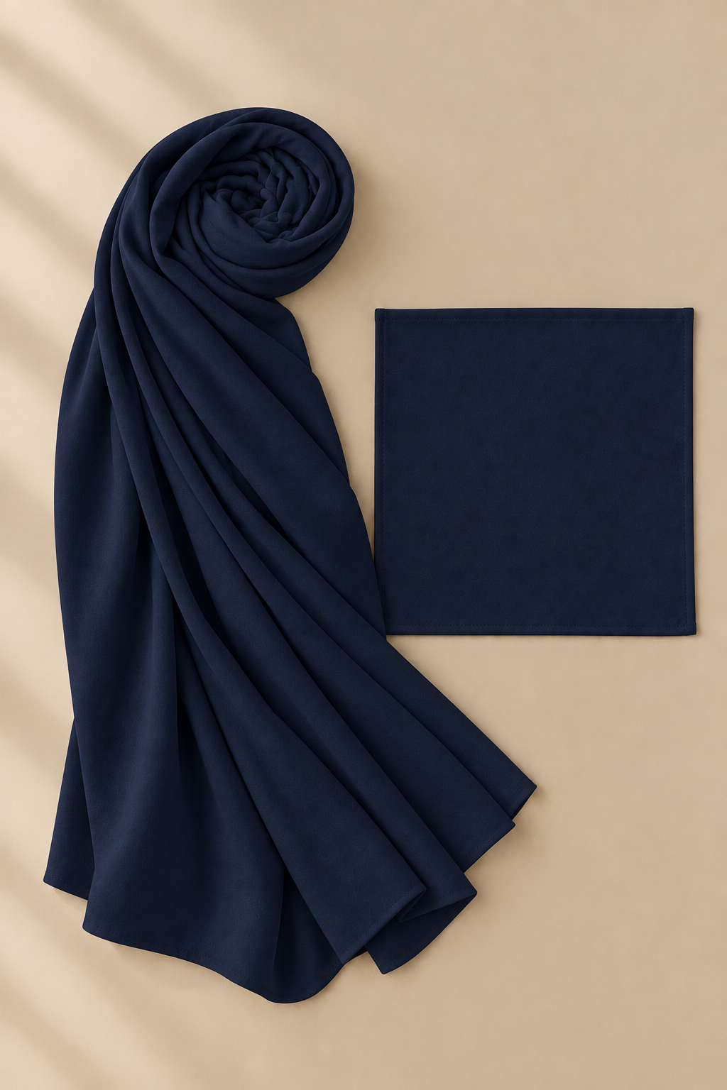 Deep Navy modal hijab beside matching open square undercap