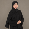 Model wearing a soft black Kuwait jersey hijab