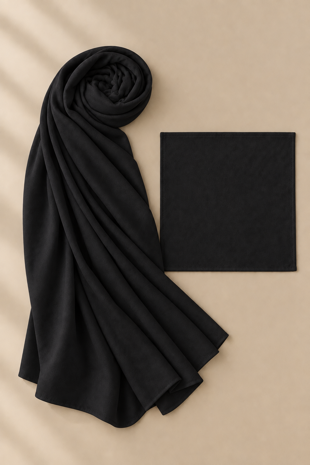 Midnight Black modal hijab beside its matching open square undercap