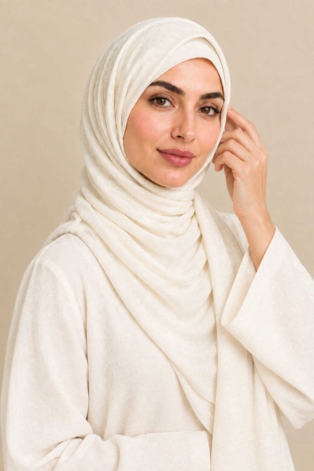Model wearing an Ivory Pearl hijab over a matching open square undercap