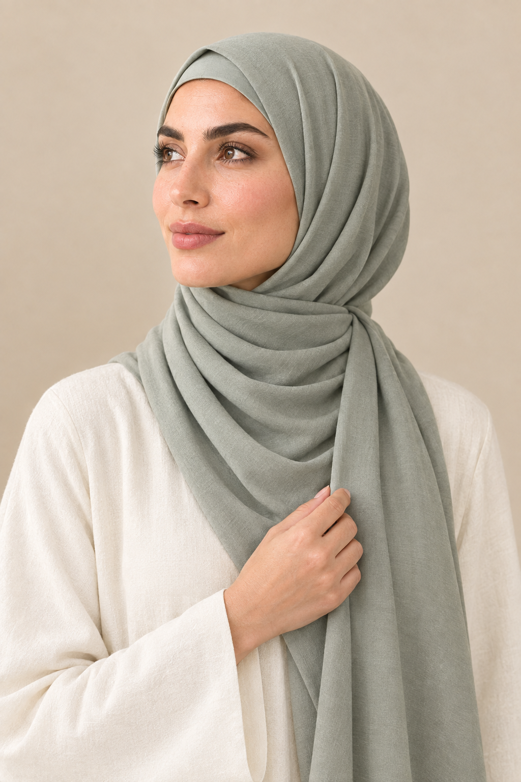 Sage hijab portrait showing matching open square undercap