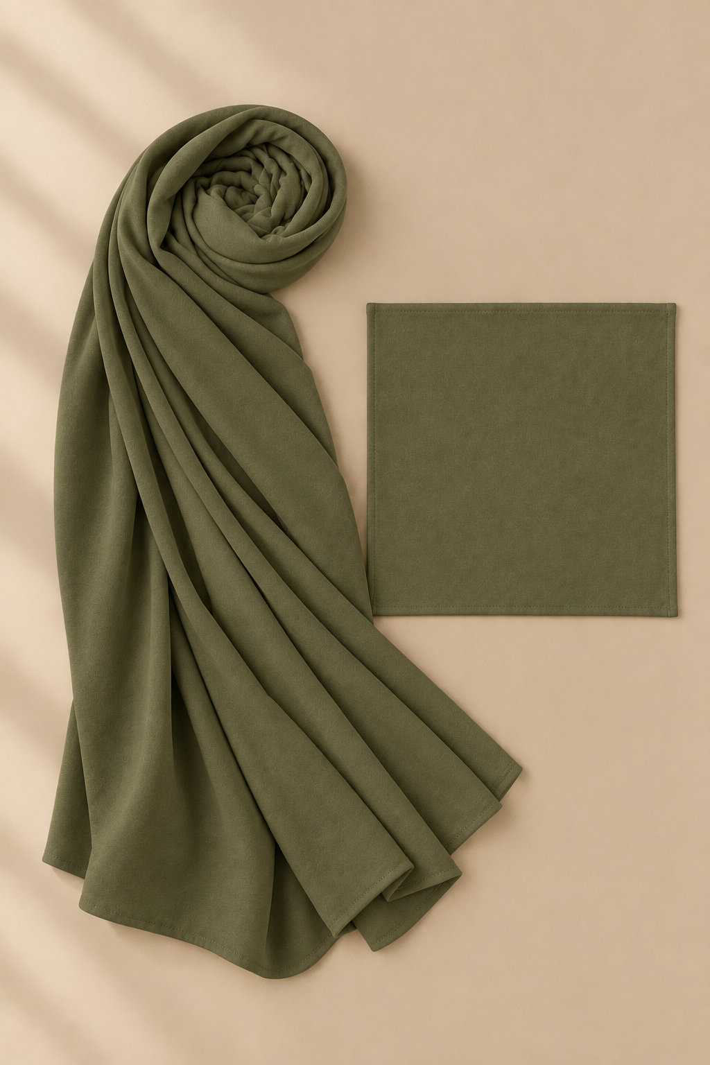 Olive Green modal hijab beside matching open square undercap