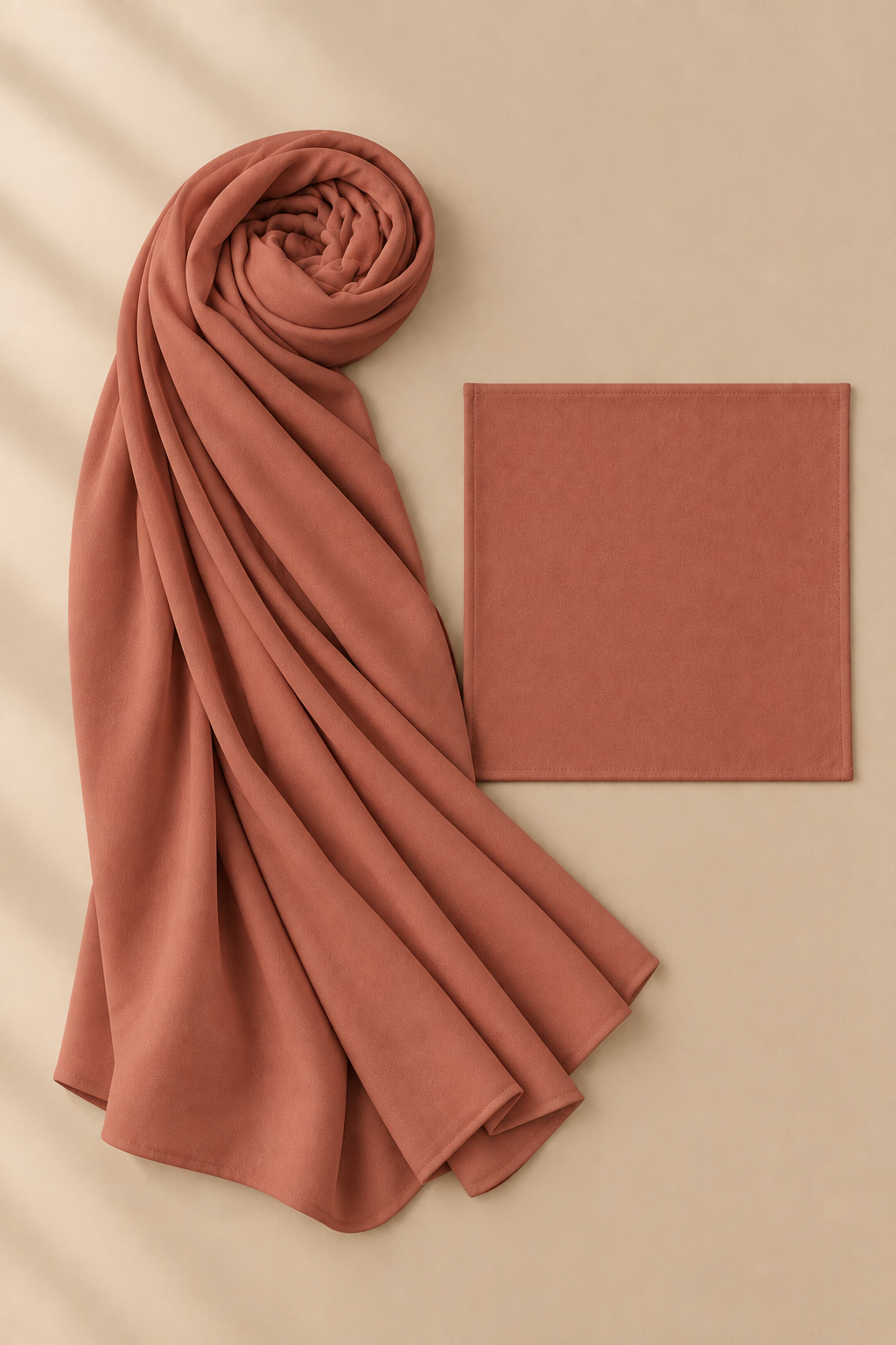 Terracotta modal hijab beside matching open square undercap