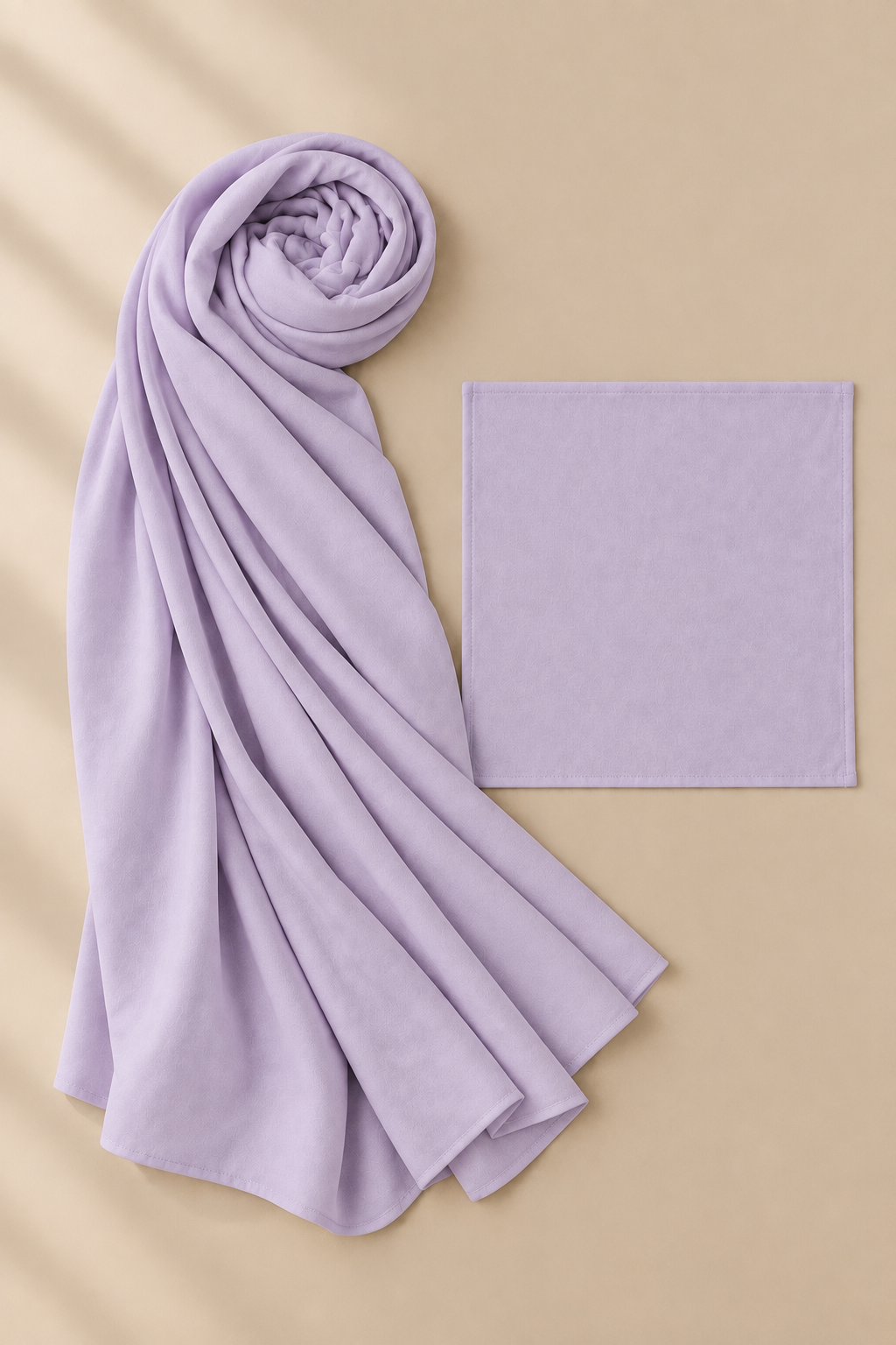 Lavender modal hijab beside matching open square undercap