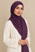 Model wearing a Plum modal hijab