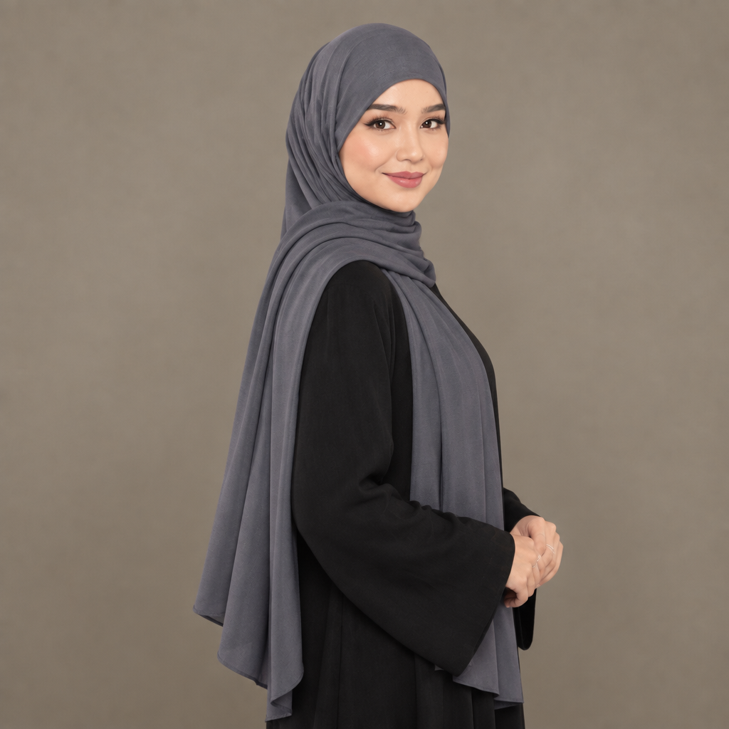 Model wearing a slate grey Kuwait jersey hijab